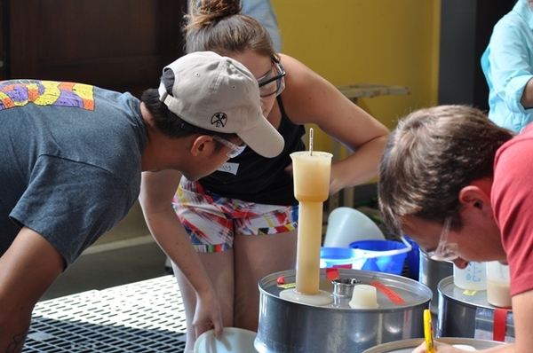 Students measure the sugar content, or brix, of the juice.