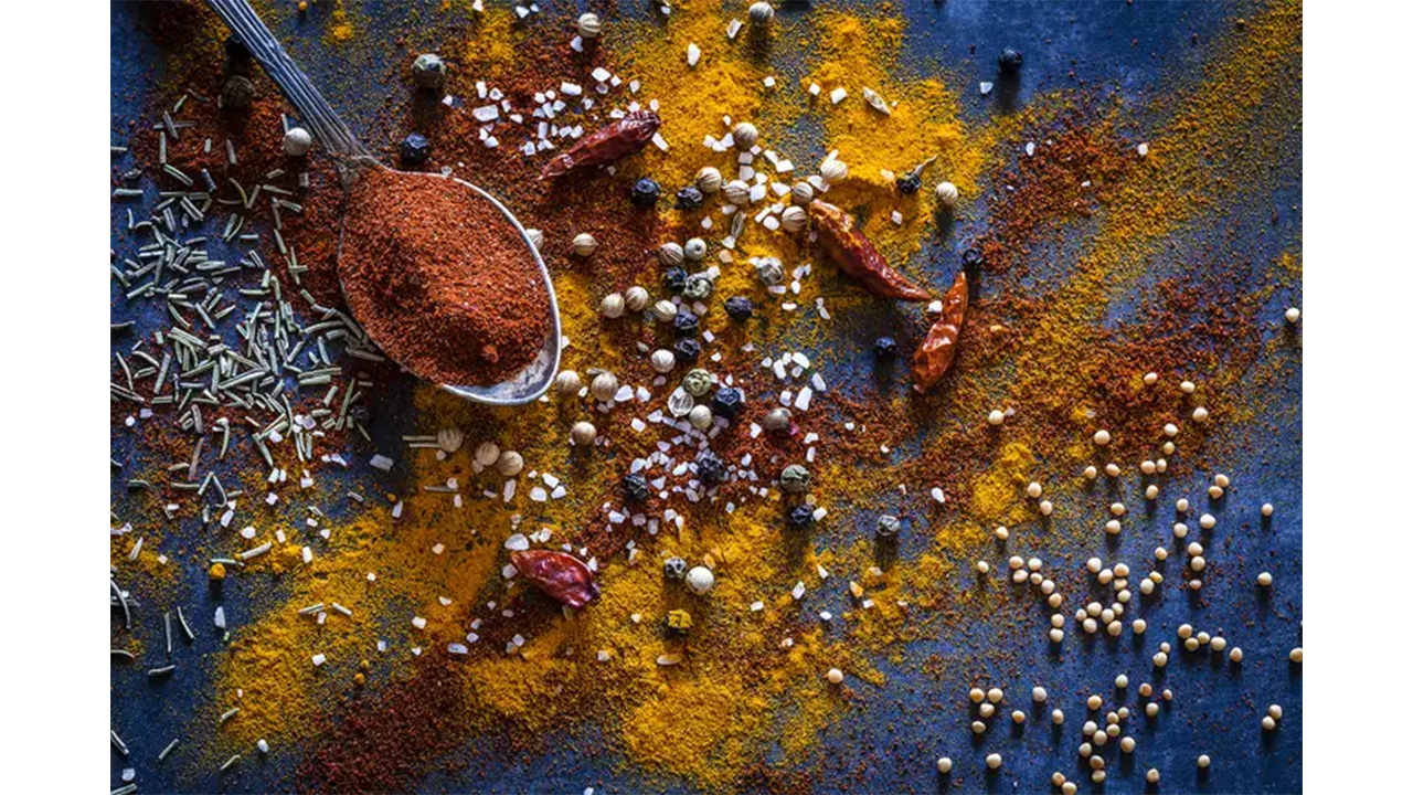 Image of spices spread out on counter - Getty