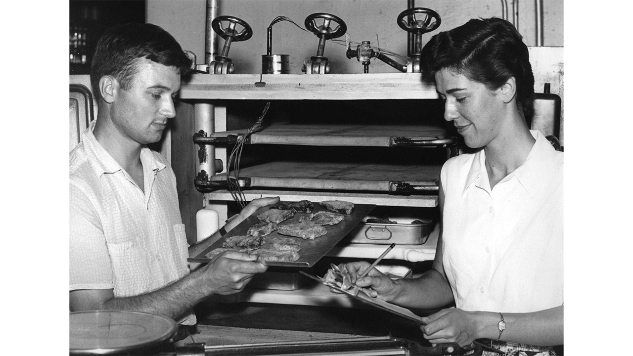 Al Tappel and student in front of the first freeze dryer in the processing laboratory of Cruess Hall; early 1950s. Courtesy of the Department of Food Science and Technology. Al Tappel and student in front of the first freeze dryer in the processing laboratory of Cruess Hall; early 1950s. Courtesy of the Department of Food Science and Technology.