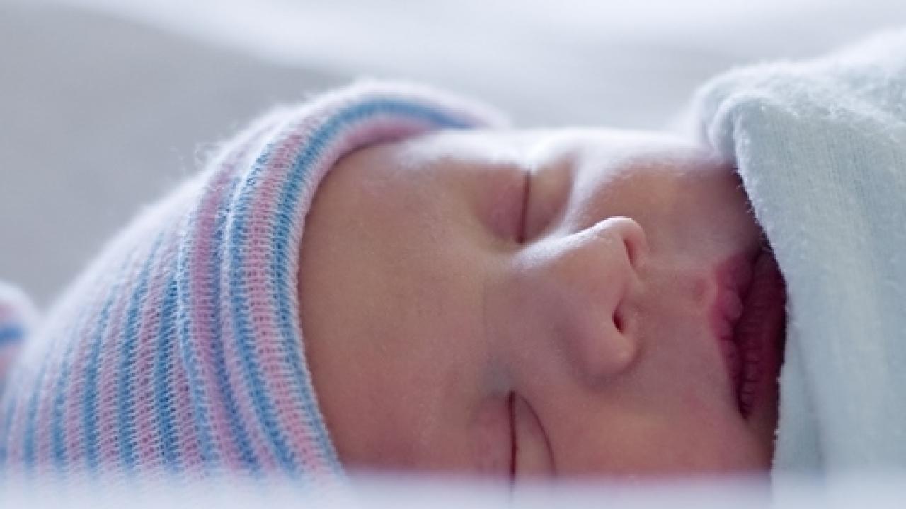 baby with cap