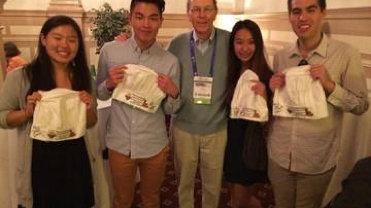 The team holding their ACS chef hat "trophies" with judge Guy Crosby. (Vivian Hsiao, Arunwong Opaspongkarn, Guy Crosby, Nopmanee Suvapatrachai, Efran Tash)