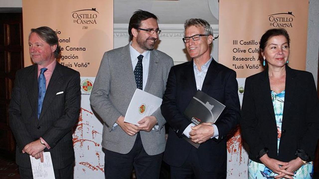 The UC Davis Olive Center’s Dan Flynn, second from right, stands alongside Juan Gómez, rector of the University of Jaén, during the award ceremony in Castillo de Canena, the castle after which the olive oil company is named