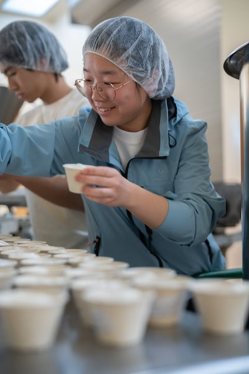 Poll Zhang makes ice cream in the FST pilot plant