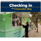 photo of student waiting for food at food truck